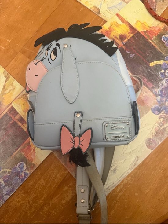 Loungefly Handbags - Loungefly Eeyore Mini Backpack in Light Blue with Pink Accents